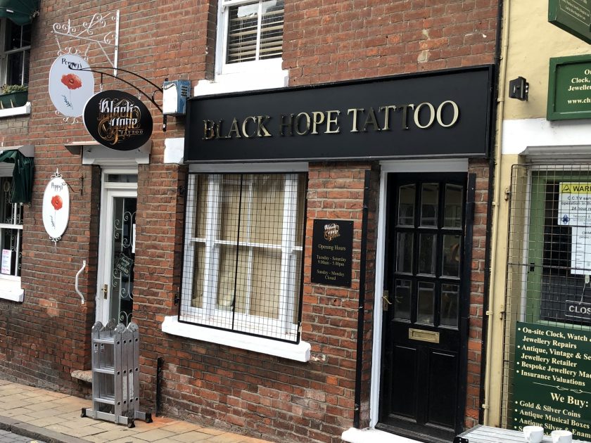 Building Signs. Fret cut lettering sign saying Black Hope Tattoo. Produced by Impact Signs